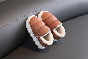 Detailed view of children's waterproof winter snow boots with thick warm fleece lining.