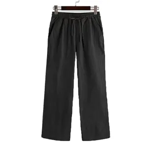 Men's casual solid color loose wide-leg cotton pants displayed on a wooden hanger