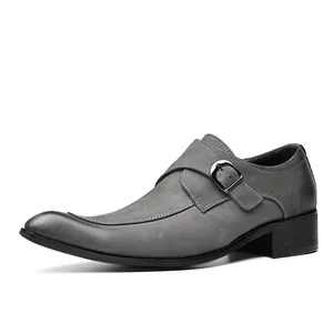 Elegant grey suede monk strap dress shoes for men with a stylish pointed toe design.
