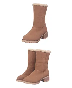 Detailed view of women's mid-calf boots showing faux fur lining and chunky lug sole