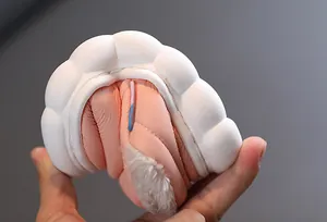 Flexible thick white sole of pink children's waterproof winter boots with fur lining
