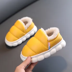 Cozy yellow waterproof children's snow boots with soft fleece lining and thick sole