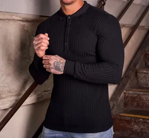Close-up of black long-sleeved vertical ribbed polo shirt for men fitness style.
