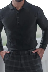 Close-up of men's dark vertical stripe ribbed long-sleeve polo shirt with elastic fit