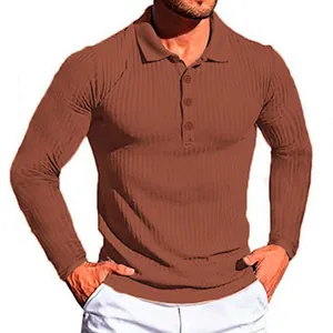 Detail view of men's rust brown long-sleeve ribbed polo shirt with button placket