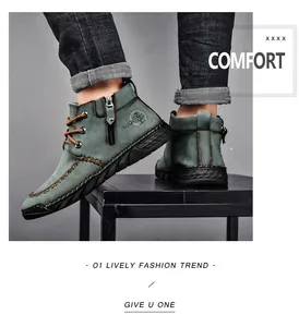 Detail of men's teal mid-top Martin boots with side zipper and rugged sole profile
