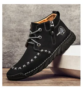 Close-up of black men's mid-cut Martin boots with zipper and stitching details