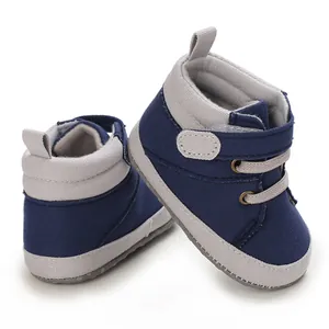 Detailed view of navy blue high-top baby walking shoes with soft soles
