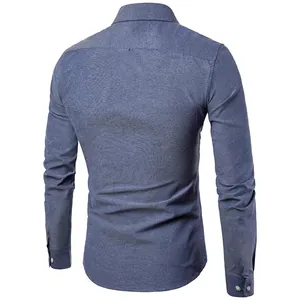 Back view of a men's blue Oxford long sleeve slim fit shirt on a white background.