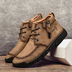 Men's tan mid-top Martin boots with side zipper and rugged anti-slip soles.