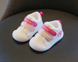 Cozy winter fleece-lined white leather infant walking shoes with pink velcro straps