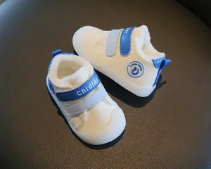 Close-up of winter baby walking shoes with warm fleece lining and non-slip soft sole