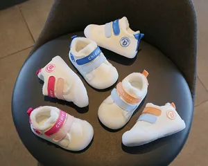 Detail view of colorful fleece-lined leather toddler walking shoes with soft soles