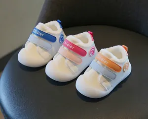 Detailed view of color variations for warm fleece-lined non-slip baby walking shoes
