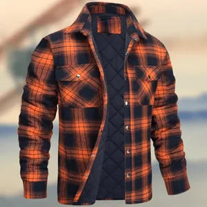 Detail view of men's orange and black plaid flannel jacket with thick quilted lining