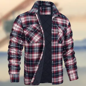 Detail view of men's red plaid jacket with quilted lining and metal buttons.