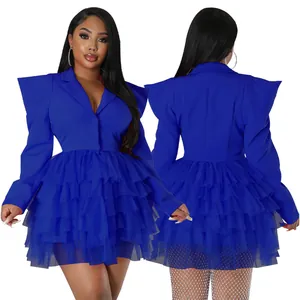 Close-up detail of a royal blue tiered ruffle mini dress featuring exaggerated shoulders