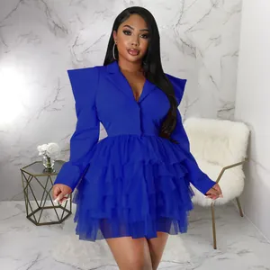 Fashionable electric blue blazer dress featuring tiered tulle skirt and sharp shoulders detail