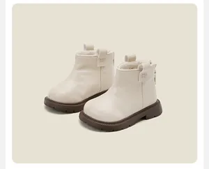Warm cream toddler Martin boots with fleece lining and sturdy brown rubber soles.
