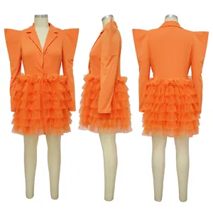 Front, side, and back views of an orange tiered cake dress with bold shoulders