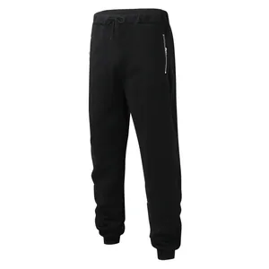 Detailed view of men's black jogger sweatpants featuring drawstring waist and silver zipper pockets