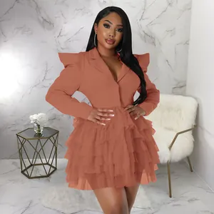 Elegant terracotta blazer dress featuring tiered ruffle tulle skirt and statement puff sleeves