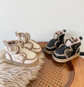Infant winter snow boots with fleece lining and buckle straps in cream and black