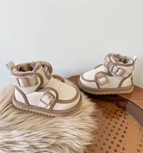 Cozy baby winter snow boots featuring warm plush lining and stylish buckle details.