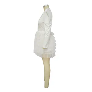 Side view of white long-sleeve blazer dress with tiered tulle cake skirt detail
