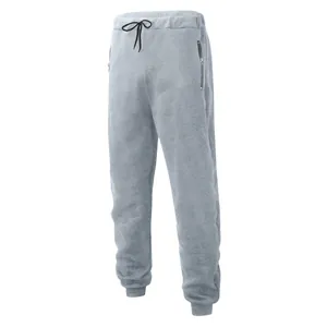 Men's grey casual joggers featuring a drawstring elastic waist and side zipper pockets