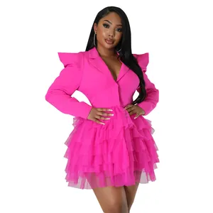 Hot pink blazer dress featuring dramatic puffy shoulders and a tiered mesh cake skirt