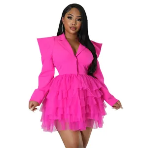 Detailed view of vibrant pink blazer tiered tulle mini dress with wing shoulders