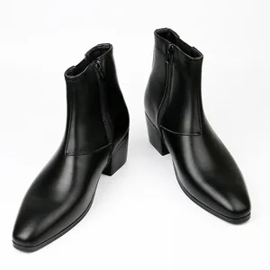 Detailed view of men's fashion black Chelsea boots with square toe and side zipper closure