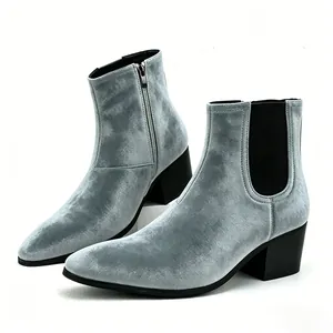 Close-up of stylish gray velvet men's Chelsea boots featuring square toe and high chunky heel