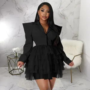 Elegant black tiered cake dress featuring a blazer style top with structured shoulders