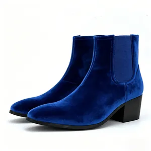 Side profile detail of men's blue velvet Chelsea boots with block heel and square toe