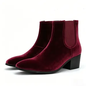 Detailed side view of men's burgundy velvet Chelsea boots with block heel and square toe