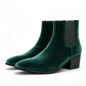 Side view of men's emerald green velvet Chelsea boots with a block heel and square toe