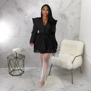 Elegant black ruffled tiered mini dress with structured shoulders and v-neckline