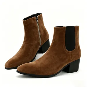Detailed view of brown suede men's high heel Chelsea boots with square toe.