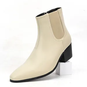 Side view of a men's cream square toe Chelsea boot with chunky high heel