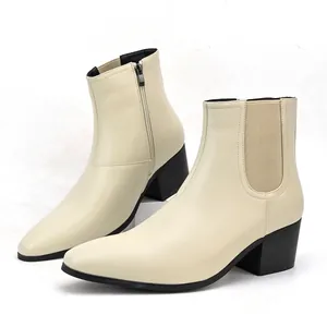 Side view of men's cream Chelsea boots with high block heel and square toe design