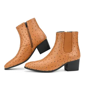 Detailed side view of men's brown Chelsea boots with ostrich skin texture and high block heels