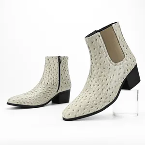 Fashionable men's ostrich texture Chelsea boots with high chunky heels and side zippers.