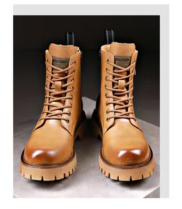 Robuuste heren Martin boots van bruin leer met dikke profielzool en zijrits