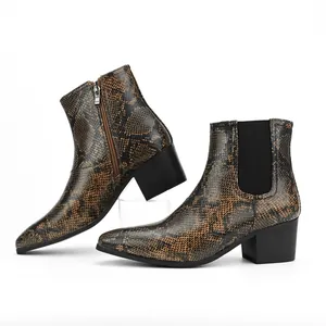Detailed side view of fashionable men's snakeskin Chelsea boots with chunky high heels