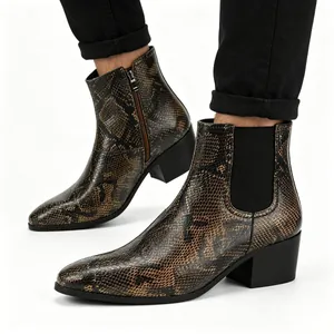 Detail of men's snakeskin Chelsea boots with chunky high heel and square toe design