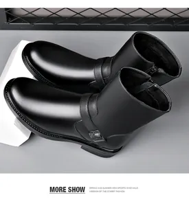 Close-up of men's black leather British style boots featuring side buckle and zipper