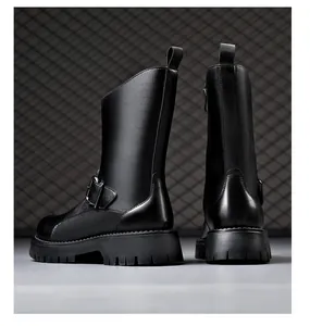 Detailed side view of mens black leather motorcycle boots with a thick lug sole