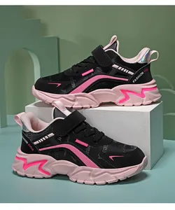 Close-up side view of stylish black and pink girls' lightweight non-slip running sneakers